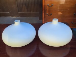 Pair of white oval base vases