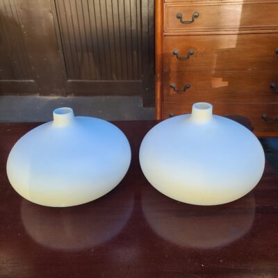 Pair of white oval base vases